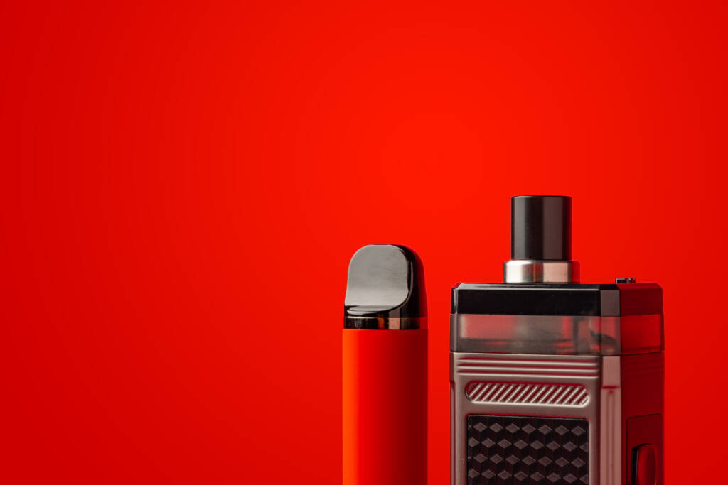electronic cigarettes with red background 2026 01 08 05 30 15 utc